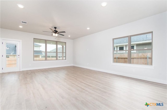 1974 Rosson St, Nolanville, TX 76559 - empty room featuring ceiling fan, wood finished floors, baseboards, and recessed lighting