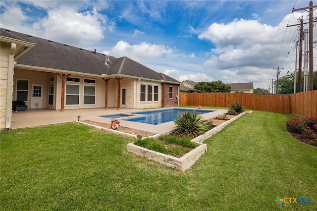 view of swimming pool featuring a patio area, a fenced backyard, a fenced in pool, and a yard
