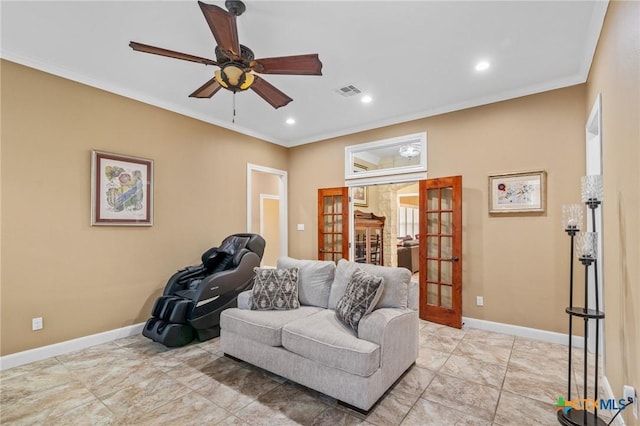 sitting room with a ceiling fan, french doors, baseboards, ornamental molding, and visible vents