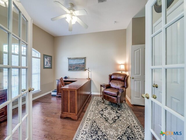 home office with baseboards, dark wood-style floors, and french doors