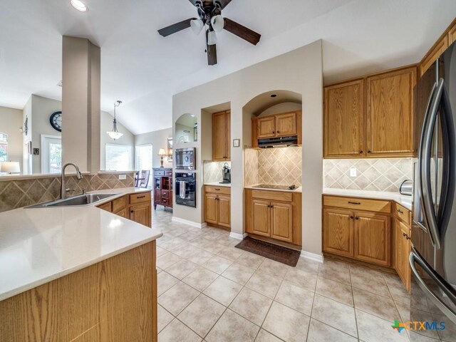 kitchen with extractor fan, a sink, ceiling fan, black appliances, and brown cabinets