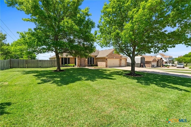 1428 Windcrest Dr, Round Rock, TX 78664 - view of property hidden behind natural elements with concrete driveway, an attached garage, and brick siding