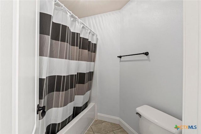1428 Windcrest Dr, Round Rock, TX 78664 - bathroom featuring toilet, baseboards, tile patterned flooring, and shower / bath combination with curtain