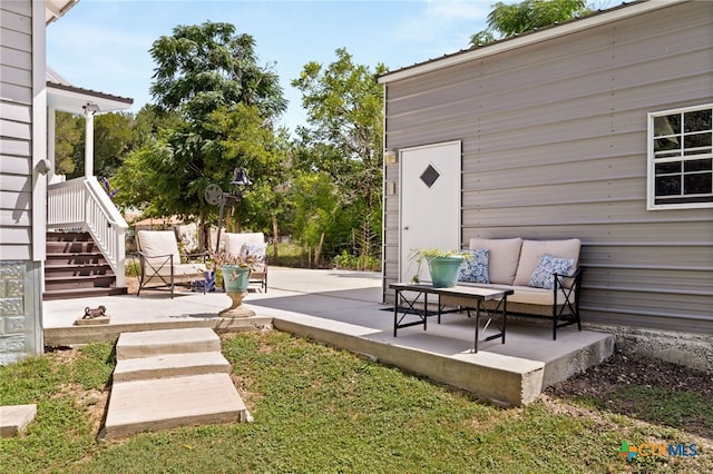 view of yard with an outdoor hangout area and a patio area