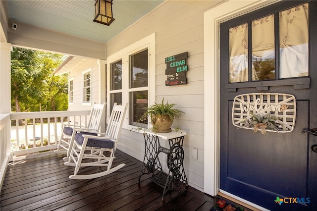 wooden deck with covered porch