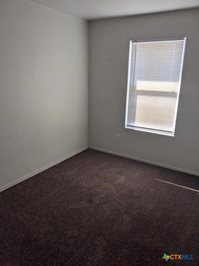 1200 Industrial Blvd, Killeen, TX 76549 - empty room featuring dark carpet