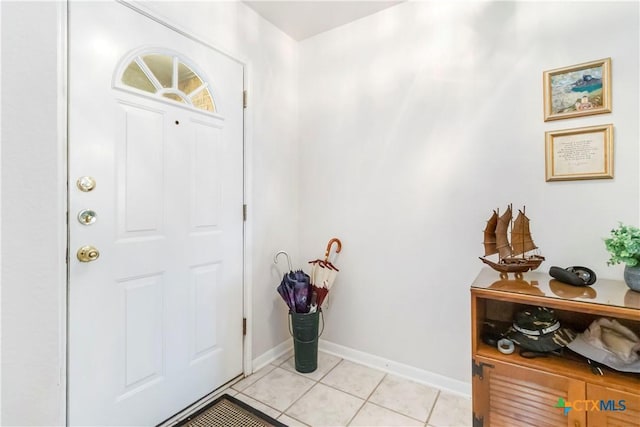 2039 Cornerstone Dr, New Braunfels, TX 78130 - foyer entrance featuring light tile patterned floors and baseboards