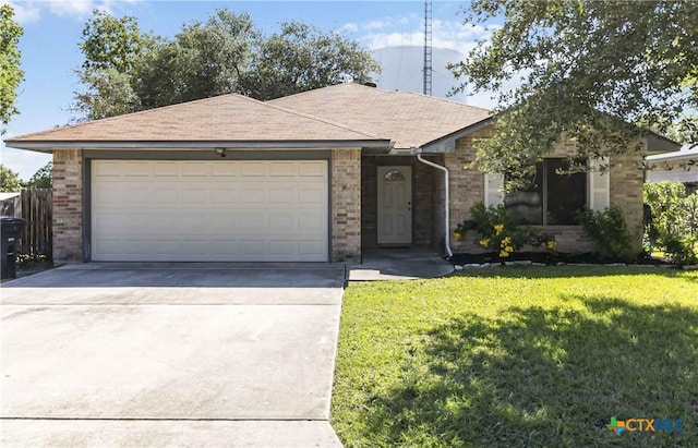 2039 Cornerstone Dr, New Braunfels, TX 78130 - ranch-style house with driveway, a garage, a front lawn, and brick siding