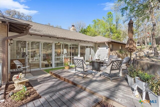 deck featuring a sunroom