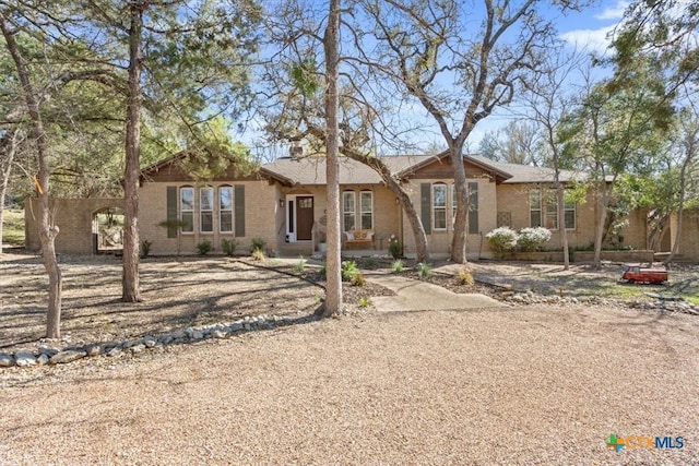 single story home with brick siding