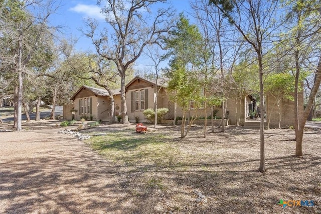 view of yard with an outdoor fire pit
