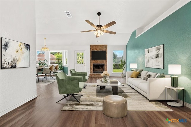 809 Filly Ln, Temple, TX 76504 - living room with wood finished floors, baseboards, vaulted ceiling, a fireplace, and ceiling fan