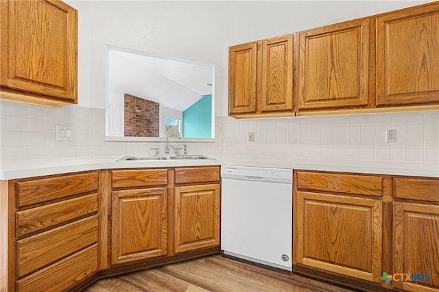 809 Filly Ln, Temple, TX 76504 - kitchen with dishwasher, a sink, tasteful backsplash, light countertops, and vaulted ceiling