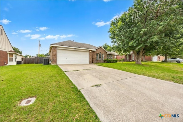809 Filly Ln, Temple, TX 76504 - view of front of property featuring brick siding, driveway, an attached garage, and cooling unit