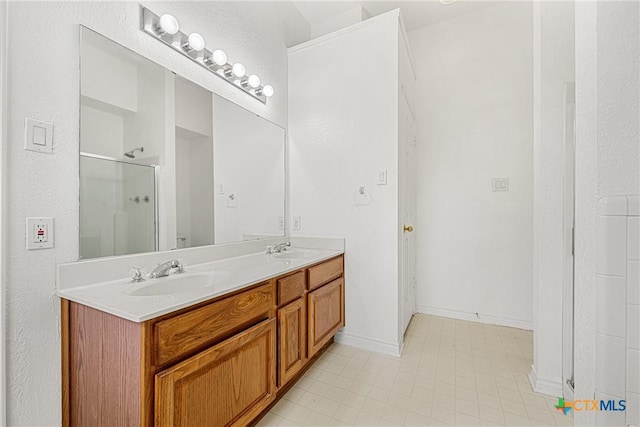 809 Filly Ln, Temple, TX 76504 - full bath featuring a shower stall, double vanity, and tile patterned flooring