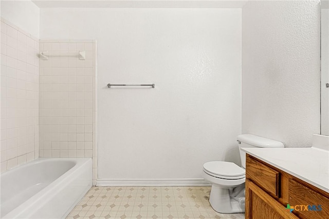 809 Filly Ln, Temple, TX 76504 - full bathroom featuring tile patterned floors, toilet, vanity, baseboards, and shower / bath combination