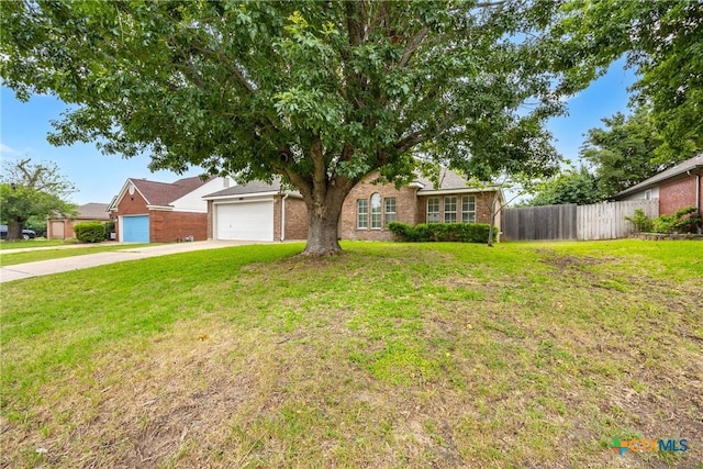 809 Filly Ln, Temple, TX 76504 - view of front of property with brick siding, driveway, and an attached garage