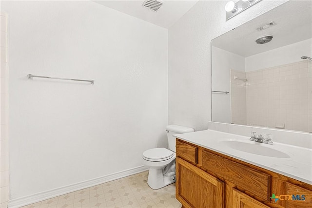 809 Filly Ln, Temple, TX 76504 - full bath with tile patterned floors, a tile shower, toilet, vanity, and baseboards