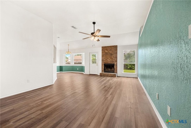 809 Filly Ln, Temple, TX 76504 - unfurnished living room featuring wood finished floors, a ceiling fan, a fireplace, and baseboards