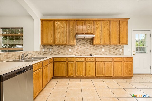 958 River Ter, New Braunfels, TX 78130 - kitchen featuring dishwasher, under cabinet range hood, light countertops, and black electric cooktop