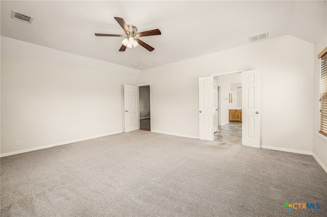 958 River Ter, New Braunfels, TX 78130 - unfurnished bedroom featuring carpet floors, vaulted ceiling, and ceiling fan