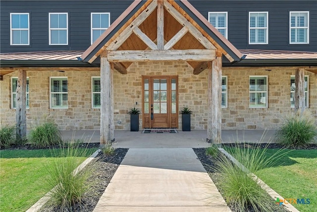 8300 Spicewood Springs Rd, China Spring, TX 76633 - entrance to property with a standing seam roof, stone siding, and metal roof
