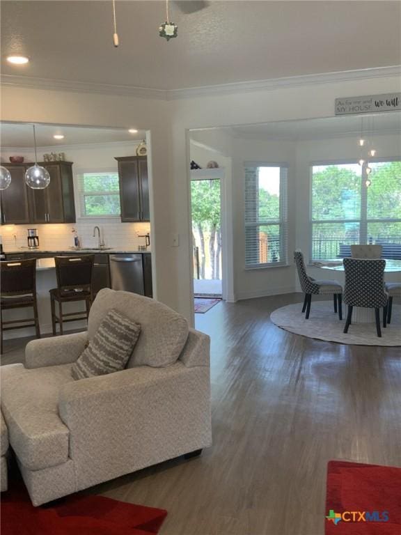 5818 Hamlet Dr, Belton, TX 76513 - living room featuring ornamental molding, wood finished floors, and recessed lighting