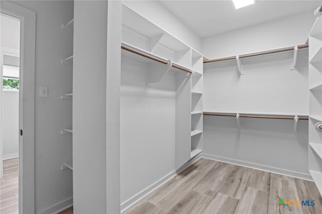 4430 Cedar Creek Rd, Temple, TX 76504 - spacious closet with wood finished floors