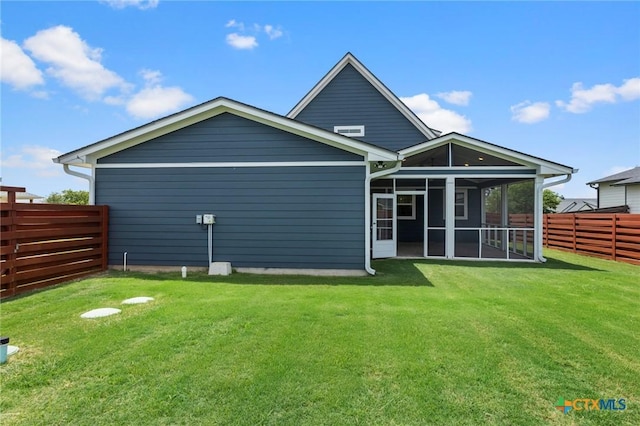 4430 Cedar Creek Rd, Temple, TX 76504 - rear view of house with a fenced backyard and a sunroom