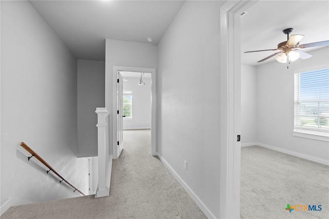4430 Cedar Creek Rd, Temple, TX 76504 - hallway with an upstairs landing, carpet floors, and plenty of natural light