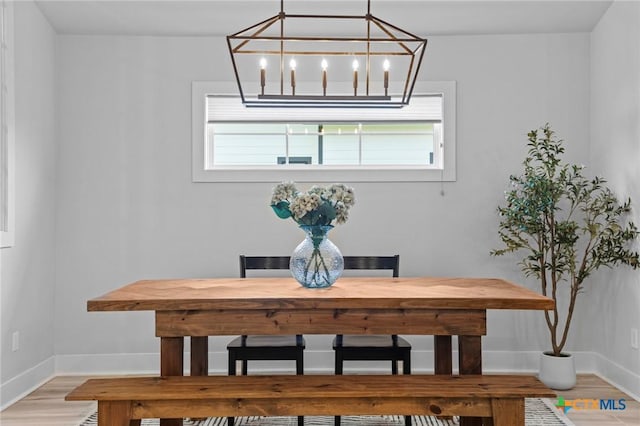 4430 Cedar Creek Rd, Temple, TX 76504 - dining space with a chandelier and light wood finished floors