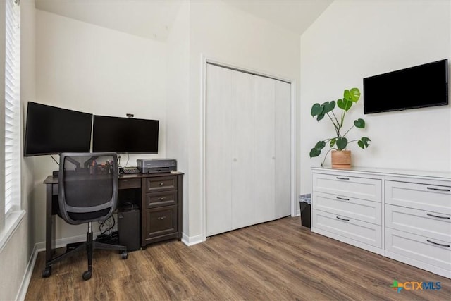 7204 Bluegrass Ct, Temple, TX 76502 - home office featuring dark wood-style floors and baseboards