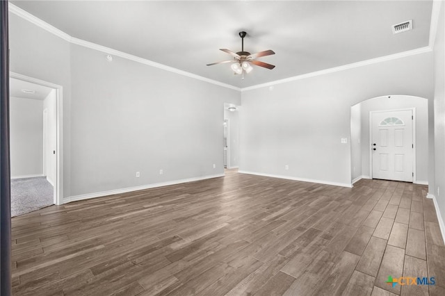 2550 Belle Hubbard Trl, Belton, TX 76513 - unfurnished room with a ceiling fan, arched walkways, wood finished floors, and ornamental molding
