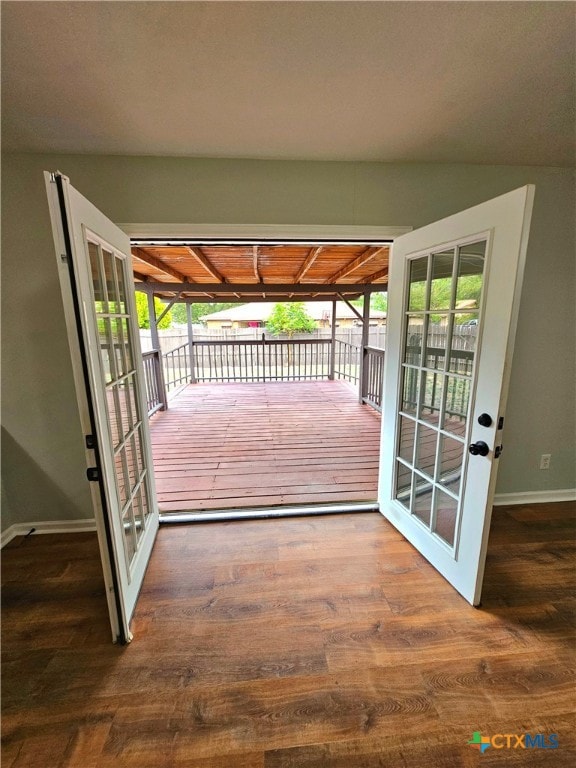 entryway featuring french doors and dark hardwood / wood-style floors