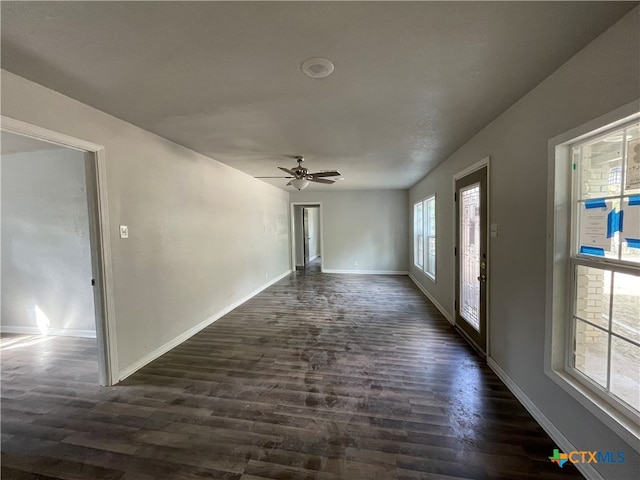 entryway featuring ceiling fan and dark hardwood / wood-style floors