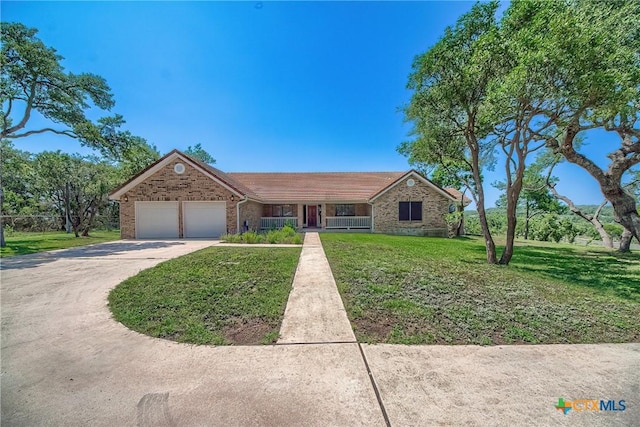 2721 Barton Hill Dr, Bulverde, TX 78163 - ranch-style home with a garage, driveway, and a front yard