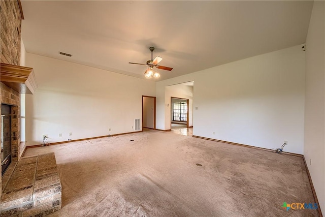 2721 Barton Hill Dr, Bulverde, TX 78163 - unfurnished living room featuring a brick fireplace, a ceiling fan, carpet, and baseboards