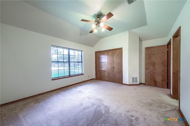 2721 Barton Hill Dr, Bulverde, TX 78163 - unfurnished bedroom featuring carpet floors, baseboards, vaulted ceiling, a closet, and ceiling fan