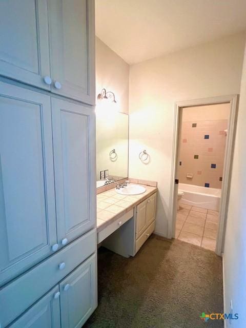 full bath featuring vanity, toilet, and tub / shower combination