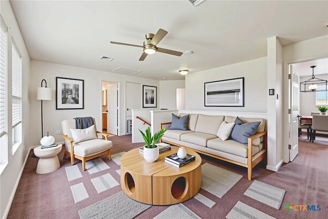 2204 Mikulec Dr, Killeen, TX 76542 - living area with carpet, a ceiling fan, and baseboards