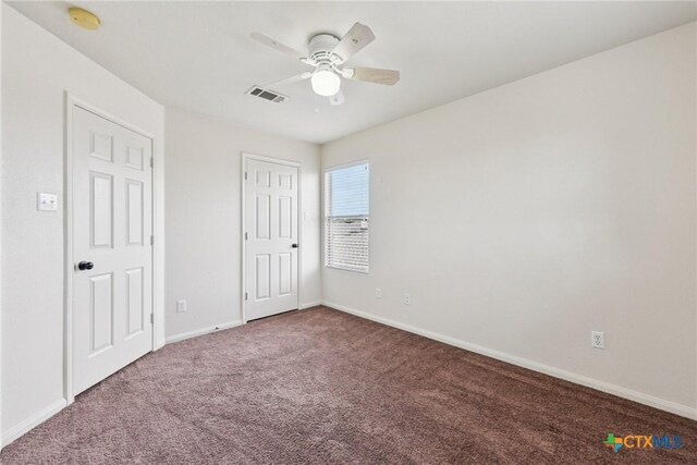 2204 Mikulec Dr, Killeen, TX 76542 - unfurnished bedroom with carpet floors, baseboards, and ceiling fan