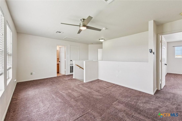 2204 Mikulec Dr, Killeen, TX 76542 - empty room featuring carpet flooring, ceiling fan, and baseboards