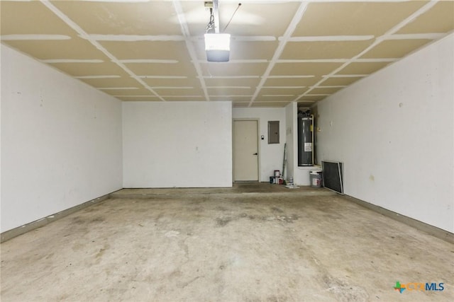 2204 Mikulec Dr, Killeen, TX 76542 - garage with electric water heater, electric panel, and baseboards