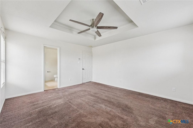 2204 Mikulec Dr, Killeen, TX 76542 - unfurnished room featuring a tray ceiling, ceiling fan, carpet floors, and baseboards