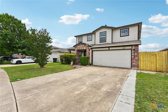 2204 Mikulec Dr, Killeen, TX 76542 - traditional-style house with brick siding, an attached garage, and driveway