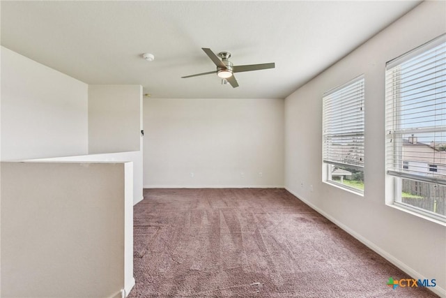 2204 Mikulec Dr, Killeen, TX 76542 - carpeted empty room with a ceiling fan, baseboards, and a smoke detector
