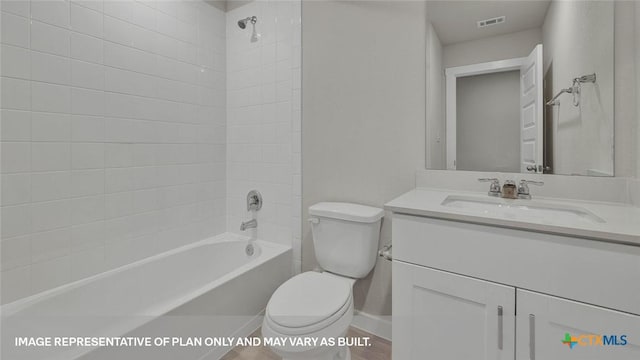 575 Radley Rd, Lockhart, TX 78644 - full bathroom featuring toilet, vanity, bathing tub / shower combination, and baseboards