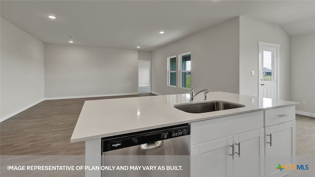 kitchen featuring a center island with sink, stainless steel dishwasher, a healthy amount of sunlight, and sink