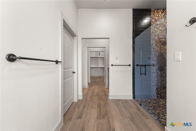 hallway with light wood-type flooring