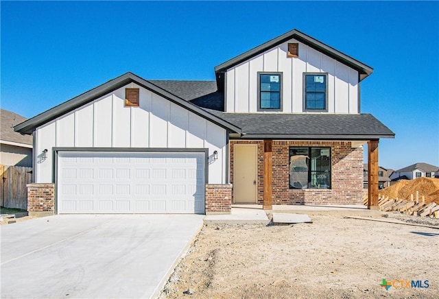 view of front of home with a garage